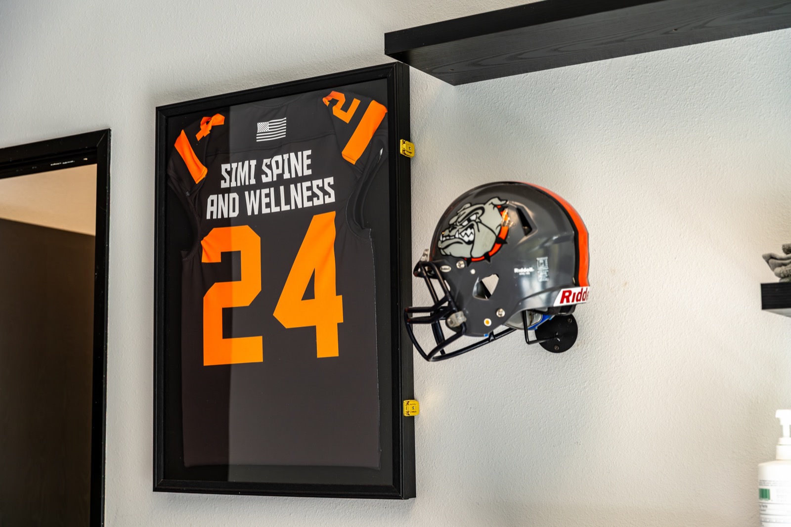Sports memorabilia on the wall inside Simi Valley Spine & Wellness